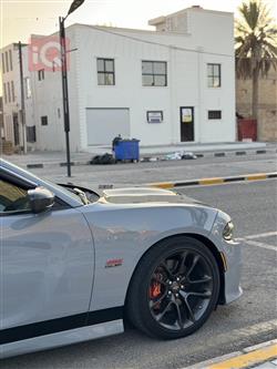 دۆج چارجەر